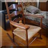 F81. Rush seat rocking chair.